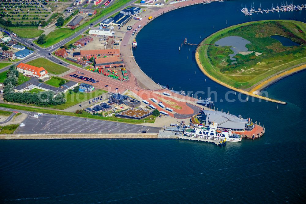 Aerial photograph Norderney - Faehr- Hafenanlagen an der Meeres- Kueste der Nordseeinsel Norderney Mit den Faehrschiff Frisia III im Bundesland Niedersachsen, Deutschlan