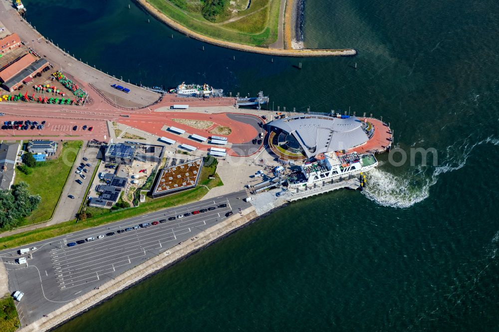 Aerial image Norderney - Faehr- Hafenanlagen an der Meeres- Kueste der Nordseeinsel Norderney Mit den Faehrschiff Frisia III im Bundesland Niedersachsen, Deutschlan