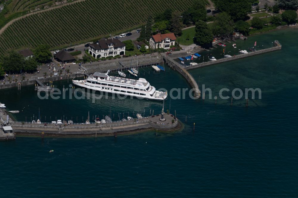 Meersburg from above - Ferry port facilities on the lake shore on street Uferpromenade in Meersburg at Bodensee in the state Baden-Wuerttemberg, Germany