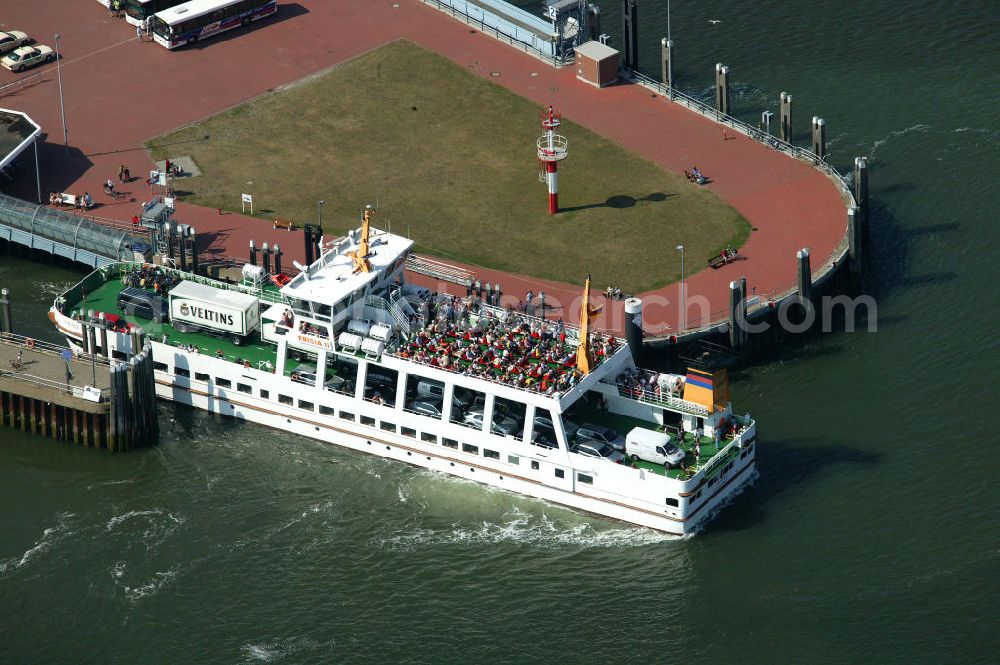 Aerial image Norderney - Blick auf eine Fähre am Hafen von Norderney. Der Hafen Norderney dient hauptsächlich als Fährhafen und Sportboothafen. View of a ferry at the port of Norderney. The Port Norderney serves mainly as a ferry terminal and marina.