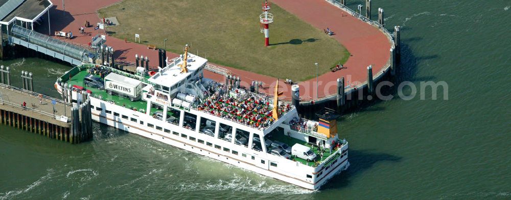 Aerial photograph Norderney - Blick auf eine Fähre am Hafen von Norderney. Der Hafen Norderney dient hauptsächlich als Fährhafen und Sportboothafen. View of a ferry at the port of Norderney. The Port Norderney serves mainly as a ferry terminal and marina.