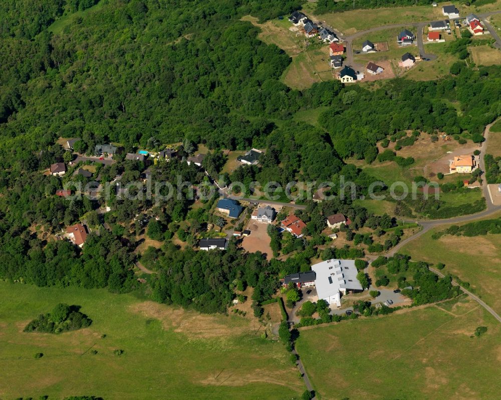 Idar-Oberstein from above - Fichtenhof in the Regulshausen part of the town of Idar-Oberstein in the state of Rhineland-Palatinate. The town is located in the county district of Birkenfeld, on the southern edge of the Hunsrueck region on both sides of the river Nahe. It is surrounded by agricultural land, meadows and forest and consists of three parts of the historic town and several villages which were incorporated - such as Regulshausen in the North of the town