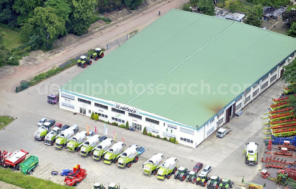 Sülzetal from the bird's eye view: Blick auf die Filiale der Firma Schröder Landmaschinen in Langenweddingen bei Magdeburg. View of the branch of the farm equipment company Schröder in Langenweddingen near Magdeburg. Kontakt: Schröder Landmaschinen GmbH, Halberstädter Straße 60, 39171 Sülzetal, Tel. 039205 653-0, info@schroeder-gruppe.de,