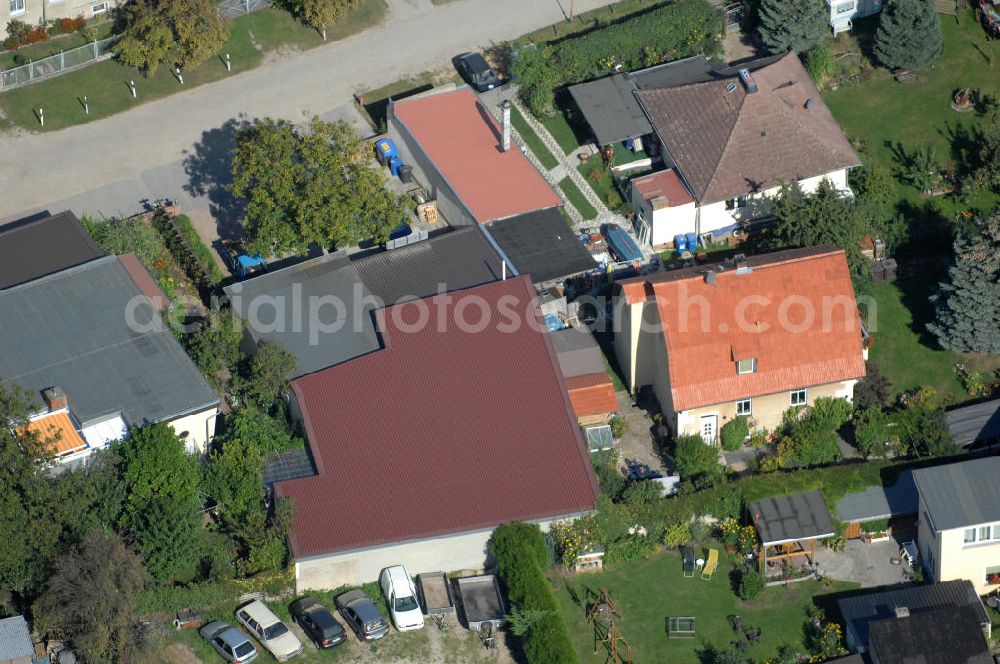 Aerial photograph Bernau - Blick auf das Gelände der Firma Michels Schraubenquelle am Rollberg 18 A in 16321 Bernau - Ladeburg.