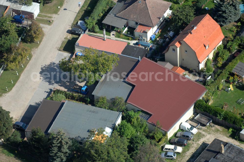 Bernau from the bird's eye view: Blick auf das Gelände der Firma Michels Schraubenquelle am Rollberg 18 A in 16321 Bernau - Ladeburg.