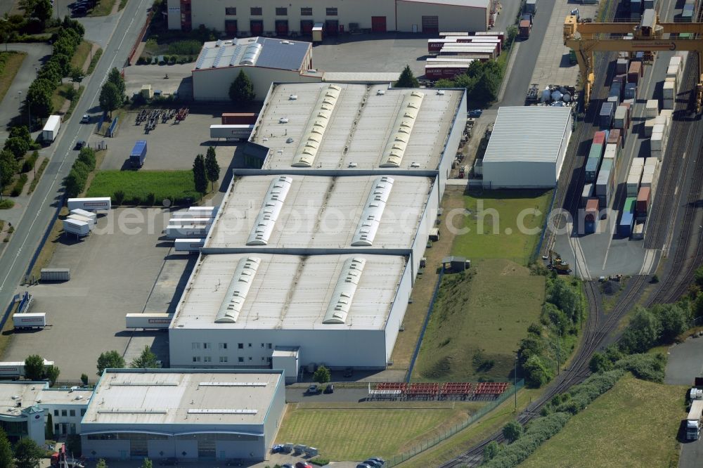 Aerial image Bönen - Company compound of Denninghaus GmbH&Co.KG in Boenen in the state of North Rhine-Westphalia. The cargo and logistics company includes a building complex of white halls in the industrial area in the North of Boenen