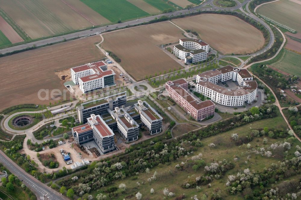 Aerial image Mainz - Company and office buildings in the South of the Gonsenheim district of Mainz in the state of Rhineland-Palatinate. The second-largest district of Mainz is located in the Northwest of the city and largely consists of industrial areas, free spaces and residential estates. The newly built office buildings are located on a field on Isaac-Fulda-Street and include administration offices, the football club 1.FSV Mainz 05 and Coface