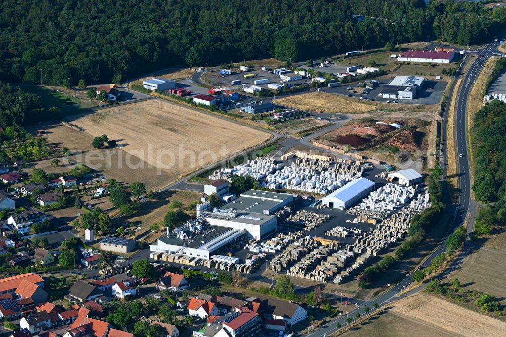 Aerial photograph Oberthulba - Company grounds and facilities of ACO Ahlmann SE & Co. KG on street Neuwirtshauser Strasse in Oberthulba in the state Bavaria, Germany