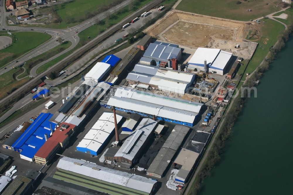 Aerial photograph Rheinfelden (Baden) - Company grounds and facilities of Rheinfelden Alloys GmbH & Co. KG at the Rhine river in Rheinfelden (Baden) in the state Baden-Wuerttemberg, Germany