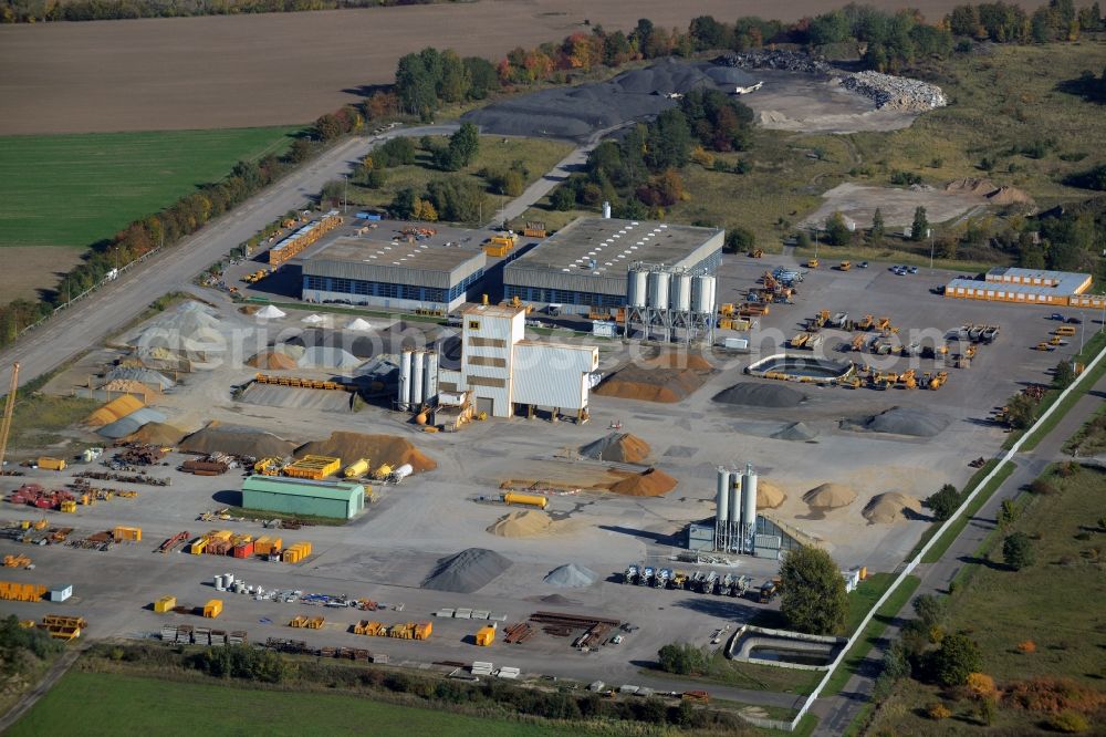 Aerial image Werneuchen - Company grounds and facilities of Berger Bau GmbH in Werneuchen in the state of Brandenburg. Berger Bau with its concrete facilities and workshosp is part of Berger Holding Group