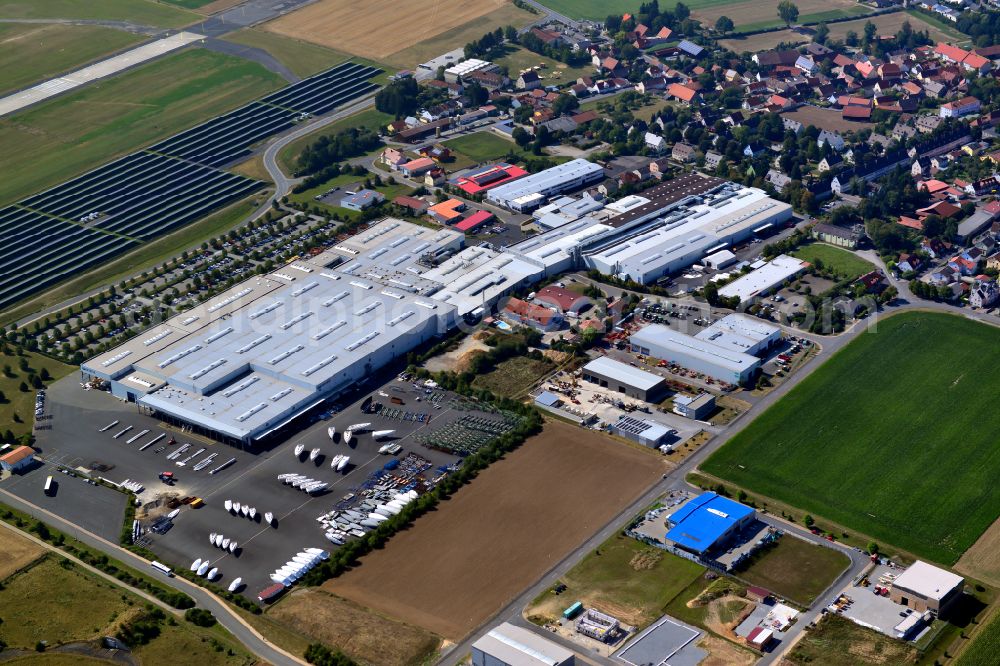 Giebelstadt from the bird's eye view: Company grounds and facilities of Bavaria Yachtbau GmbH on street Bavariastrasse in Giebelstadt in the state Bavaria, Germany