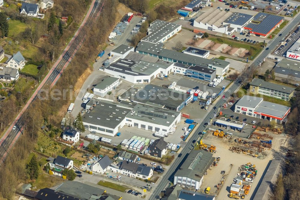 Meschede from the bird's eye view: Company grounds and facilities of EWERS Karosserie- and Fahrzeugbau GmbH & Co. KG and of Reifen Goering Service GmbH on Jahnstrasse in Meschede in the state North Rhine-Westphalia, Germany