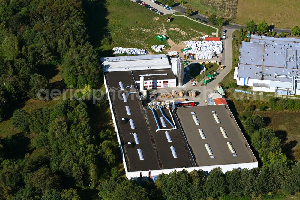 Falkenhagen from the bird's eye view: Company grounds and facilities of Falquon GmbH on street Am Huenengrab in Falkenhagen in the state Brandenburg, Germany