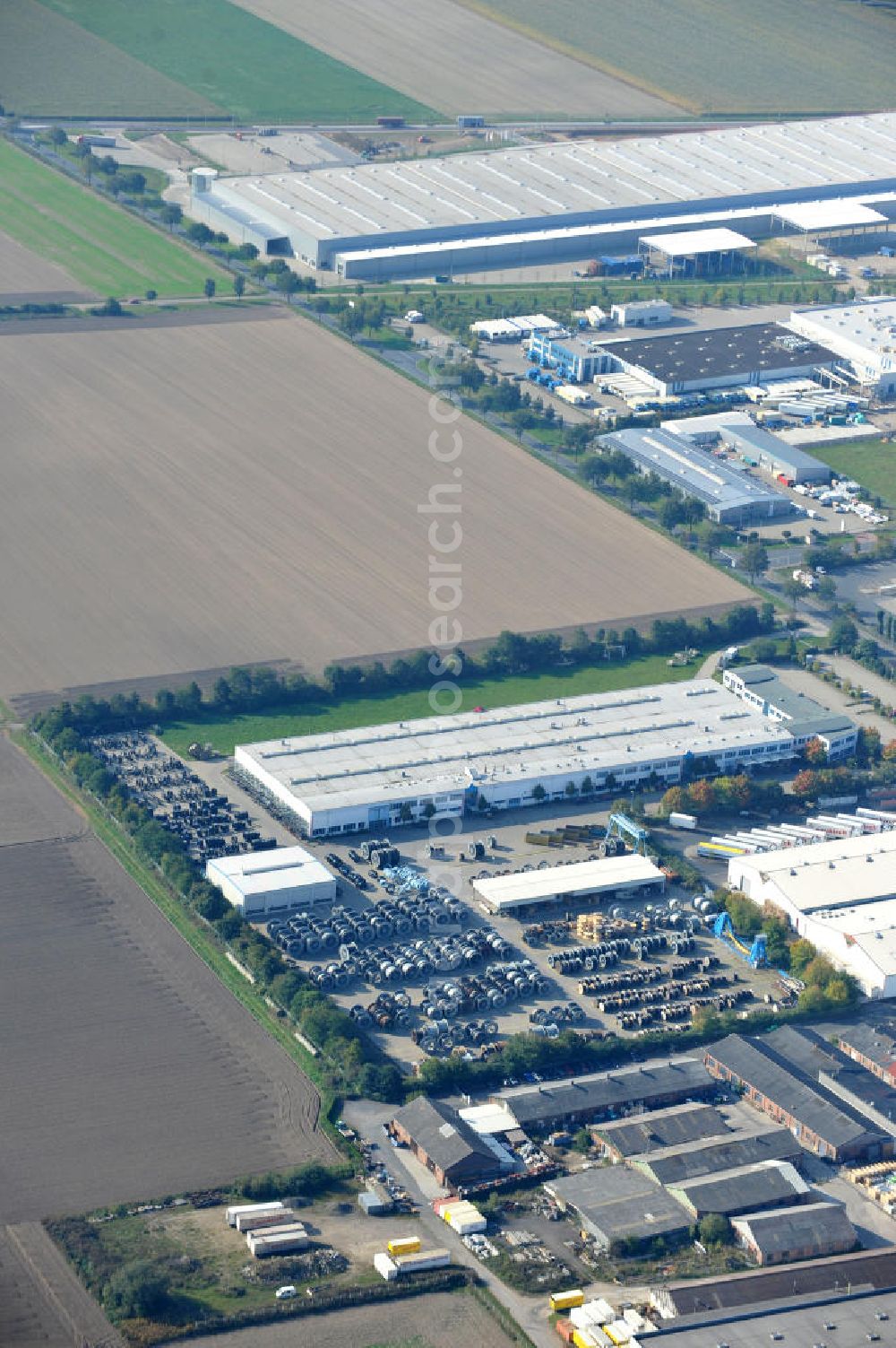 Aerial image Wunstorf - Blick auf das Firmengelände der Firma BRUGG Rohrsysteme GmbH an der Adolf Oesterheld Str. 31 in 32515 Wunstorf. Das Unternehmen ist Spezialanbieter für Rohrsysteme zum Transport von Flüssigkeiten , Gasen und Wärme. Premises of the company in Brugg Pipe Systems Inc. in Wunstorf / Lower Saxony - Germany.