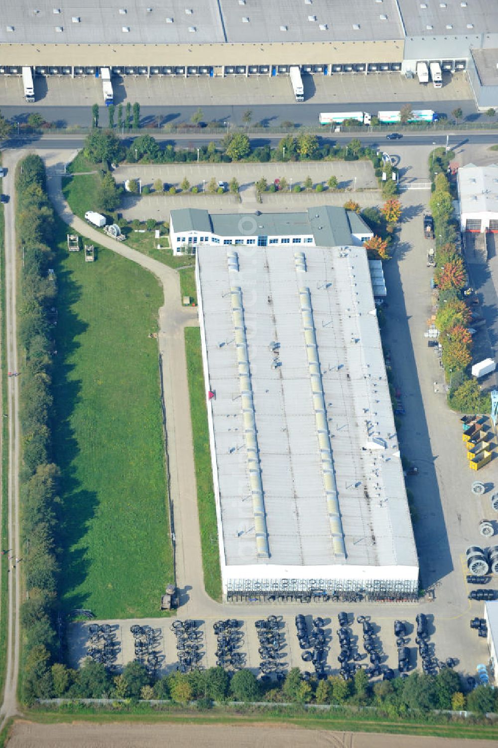 Wunstorf from above - Blick auf das Firmengelände der Firma BRUGG Rohrsysteme GmbH an der Adolf Oesterheld Str. 31 in 32515 Wunstorf. Das Unternehmen ist Spezialanbieter für Rohrsysteme zum Transport von Flüssigkeiten , Gasen und Wärme. Premises of the company in Brugg Pipe Systems Inc. in Wunstorf / Lower Saxony - Germany.