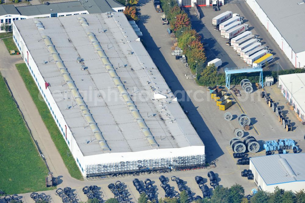 Aerial photograph Wunstorf - Blick auf das Firmengelände der Firma BRUGG Rohrsysteme GmbH an der Adolf Oesterheld Str. 31 in 32515 Wunstorf. Das Unternehmen ist Spezialanbieter für Rohrsysteme zum Transport von Flüssigkeiten , Gasen und Wärme. Premises of the company in Brugg Pipe Systems Inc. in Wunstorf / Lower Saxony - Germany.