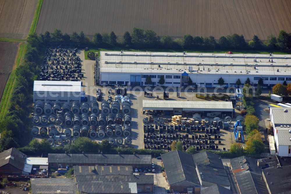 Aerial photograph Wunstorf - Blick auf das Firmengelände der Firma BRUGG Rohrsysteme GmbH an der Adolf Oesterheld Str. 31 in 32515 Wunstorf. Das Unternehmen ist Spezialanbieter für Rohrsysteme zum Transport von Flüssigkeiten , Gasen und Wärme. Premises of the company in Brugg Pipe Systems Inc. in Wunstorf / Lower Saxony - Germany.