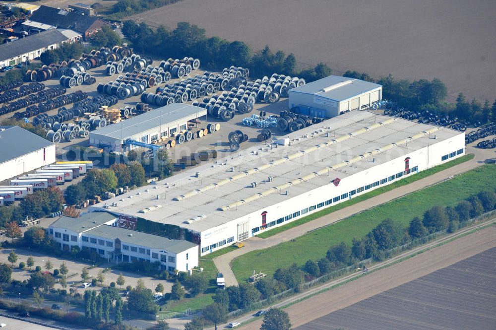 Wunstorf from above - Blick auf das Firmengelände der Firma BRUGG Rohrsysteme GmbH an der Adolf Oesterheld Str. 31 in 32515 Wunstorf. Das Unternehmen ist Spezialanbieter für Rohrsysteme zum Transport von Flüssigkeiten , Gasen und Wärme. Premises of the company in Brugg Pipe Systems Inc. in Wunstorf / Lower Saxony - Germany.