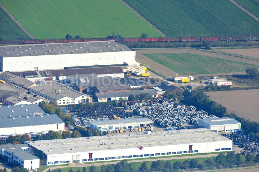 Aerial photograph Wunstorf - Blick auf das Firmengelände der Firma BRUGG Rohrsysteme GmbH an der Adolf Oesterheld Str. 31 in 32515 Wunstorf. Das Unternehmen ist Spezialanbieter für Rohrsysteme zum Transport von Flüssigkeiten , Gasen und Wärme. Premises of the company in Brugg Pipe Systems Inc. in Wunstorf / Lower Saxony - Germany.