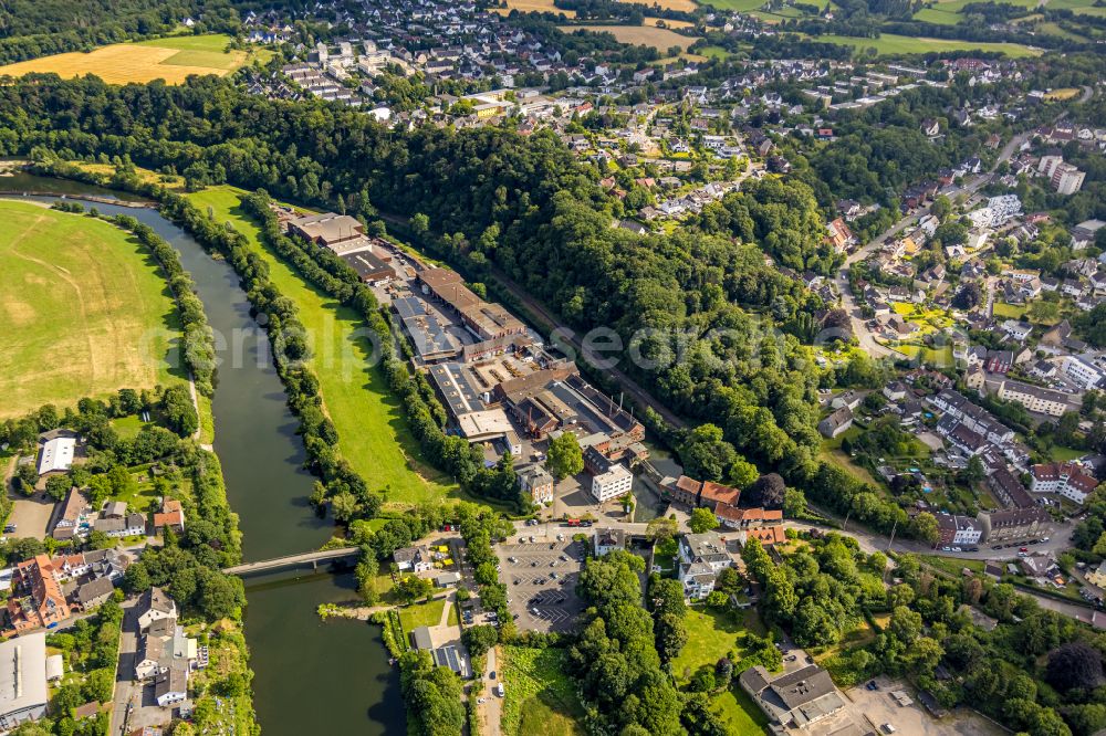 Witten from above - Company grounds and facilities of Friedr. Lohmann GmbH Works for steel in Witten in the state of North Rhine-Westphalia. The works are located on the riverbank of the river Ruhr