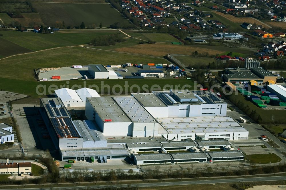 Monheim from the bird's eye view: Company premises of Hama GmbH & Co KG - Schnaeppchenmarkt with halls, company buildings and production facilities on Hagenbucher Weg in Monheim in the state Bavaria, Germany