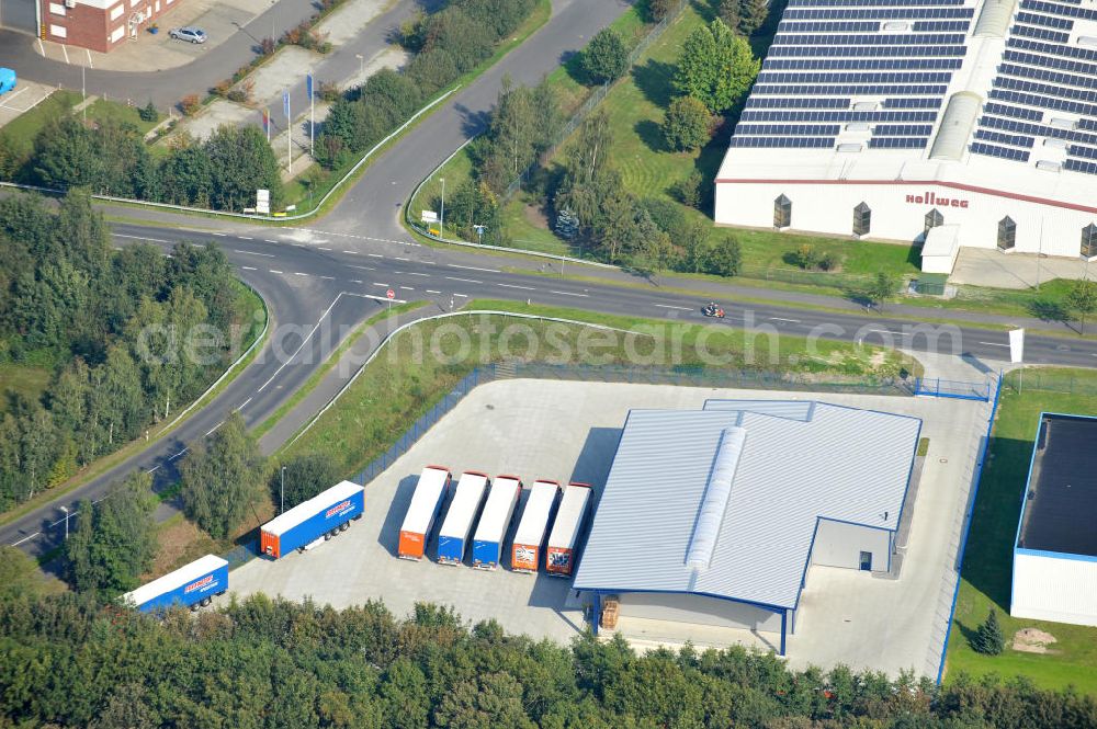 Papenburg / Niedersachsen from the bird's eye view: Blick auf das Firmengelände der Hermann Bunte GmbH & Co. KG im Gewerbegebiet an der Bahnhofstraße in Papenburg. Das Unternehmen erstellt Service- Reparatur- und Wartungsdienstleistungen im Kraftfahrzeug ( Marke Mercedes Benz) und Nutzfahrzeugbereich. Zu den Geschäftsbereichen der auf mehrere Standorte verteilten Unternehmensgruppe gehört auch das Betreiben einer LKW - Spedition. Premises of the Hermann GmbH & Co. KG in the industrial area in Papenburg / Lower Saxony.