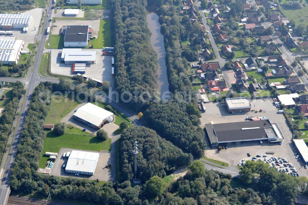 Papenburg / Niedersachsen from the bird's eye view: Blick auf das Firmengelände der Hermann Bunte GmbH & Co. KG im Gewerbegebiet an der Bahnhofstraße in Papenburg. Das Unternehmen erstellt Service- Reparatur- und Wartungsdienstleistungen im Kraftfahrzeug ( Marke Mercedes Benz) und Nutzfahrzeugbereich. Zu den Geschäftsbereichen der auf mehrere Standorte verteilten Unternehmensgruppe gehört auch das Betreiben einer LKW - Spedition. Premises of the Hermann GmbH & Co. KG in the industrial area in Papenburg / Lower Saxony.