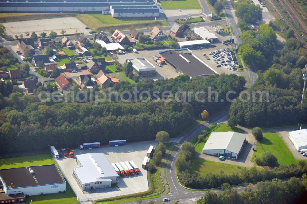 Aerial image Papenburg / Niedersachsen - Blick auf das Firmengelände der Hermann Bunte GmbH & Co. KG im Gewerbegebiet an der Bahnhofstraße in Papenburg. Das Unternehmen erstellt Service- Reparatur- und Wartungsdienstleistungen im Kraftfahrzeug ( Marke Mercedes Benz) und Nutzfahrzeugbereich. Zu den Geschäftsbereichen der auf mehrere Standorte verteilten Unternehmensgruppe gehört auch das Betreiben einer LKW - Spedition. Premises of the Hermann GmbH & Co. KG in the industrial area in Papenburg / Lower Saxony.