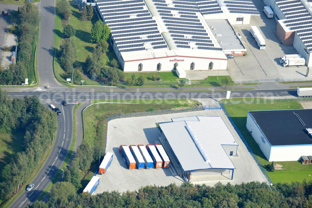 Papenburg / Niedersachsen from above - Blick auf das Firmengelände der Hermann Bunte GmbH & Co. KG im Gewerbegebiet an der Bahnhofstraße in Papenburg. Das Unternehmen erstellt Service- Reparatur- und Wartungsdienstleistungen im Kraftfahrzeug ( Marke Mercedes Benz) und Nutzfahrzeugbereich. Zu den Geschäftsbereichen der auf mehrere Standorte verteilten Unternehmensgruppe gehört auch das Betreiben einer LKW - Spedition. Premises of the Hermann GmbH & Co. KG in the industrial area in Papenburg / Lower Saxony.