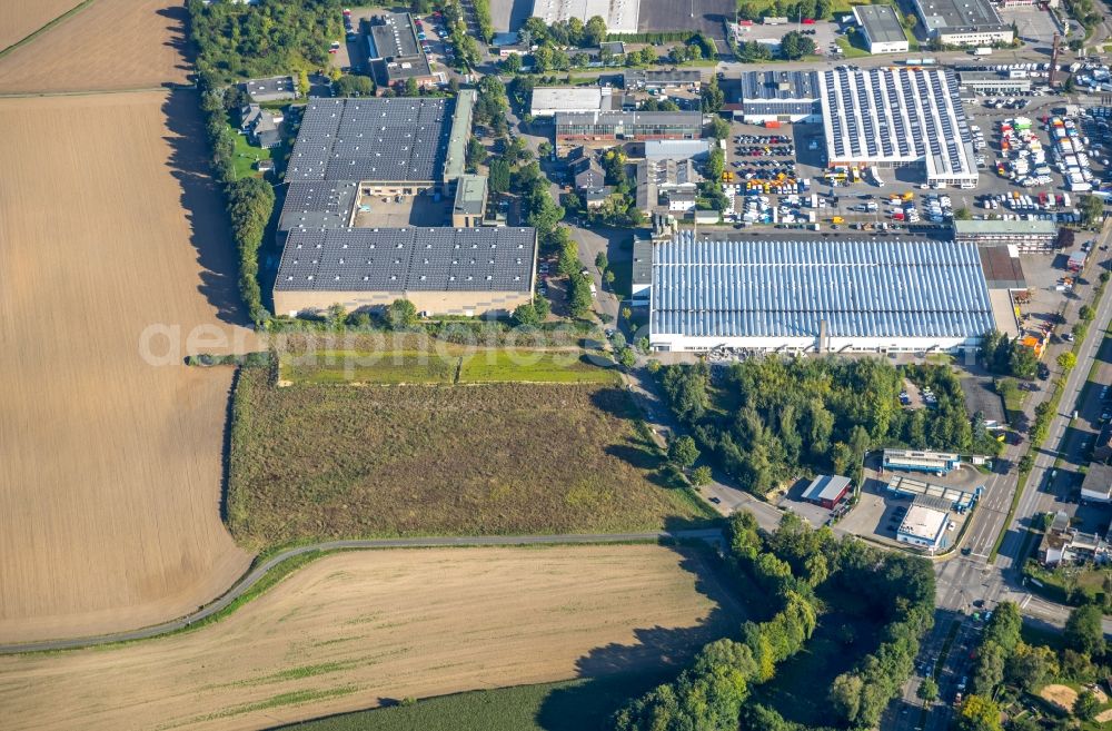 Bochum from the bird's eye view: Company grounds and facilities of HKL BAUMASCHINEN GmbH and of PSS Marketing GmbH on Burgstrasse in Bochum in the state North Rhine-Westphalia, Germany