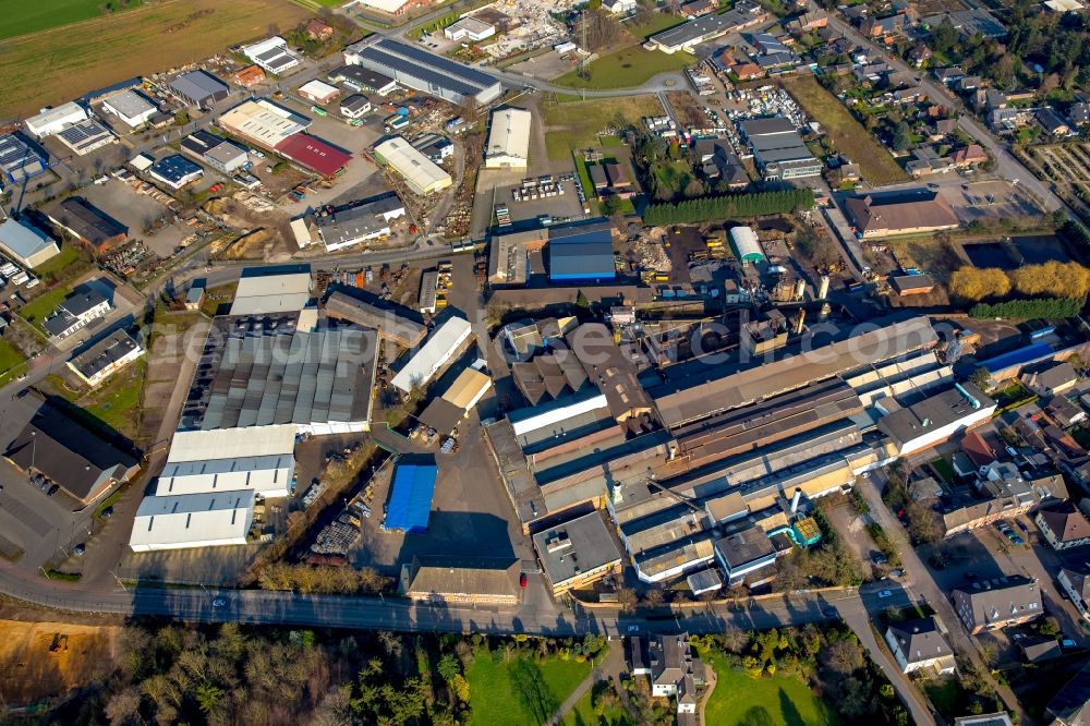 Isselburg from above - Company grounds and facilities of Isselguss GmbH and industrial area in Isselburg in the state of North Rhine-Westphalia