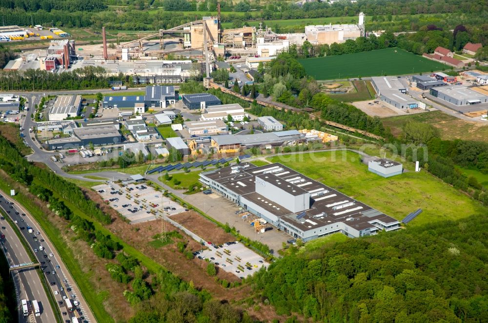 Hagen from the bird's eye view: Company premises and facilities of Kostal Industrie Elektrik GmbH in an industrial area along motorway A45 in Hagen in the state of North Rhine-Westphalia