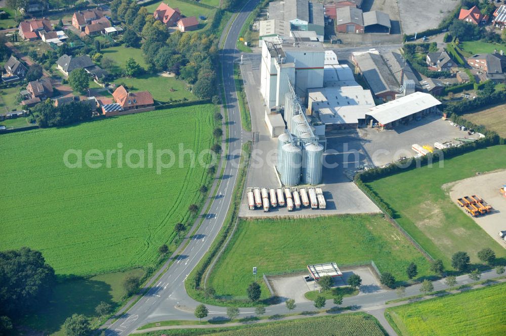 Bawinkel from the bird's eye view: Blick auf das Firmengelände des Landhandels und Kraftfutterwerk der Tihen GmbH & Co KG in Bawinkel / Niedersachsen. Die Marke TIBA Kraftfutter ist in der deutschen und europäischen Tierzucht und Landwirtschaft weit verbreitet. Premises of Tihen GmbH & Co KG in Bawinkel / Lower Saxony. The brand TIBA feed is in the German and European animal breeding and farming is widespread.