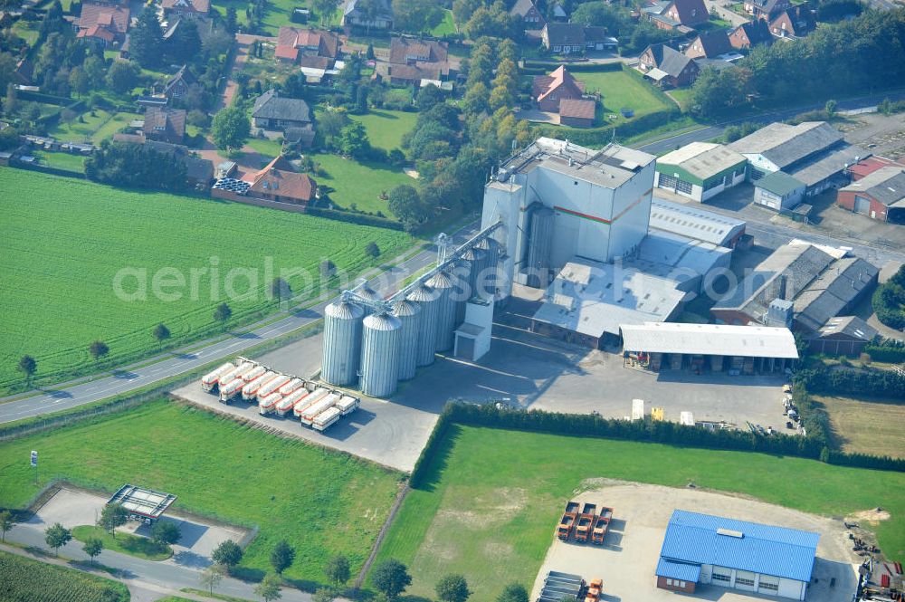 Bawinkel from above - Blick auf das Firmengelände des Landhandels und Kraftfutterwerk der Tihen GmbH & Co KG in Bawinkel / Niedersachsen. Die Marke TIBA Kraftfutter ist in der deutschen und europäischen Tierzucht und Landwirtschaft weit verbreitet. Premises of Tihen GmbH & Co KG in Bawinkel / Lower Saxony. The brand TIBA feed is in the German and European animal breeding and farming is widespread.