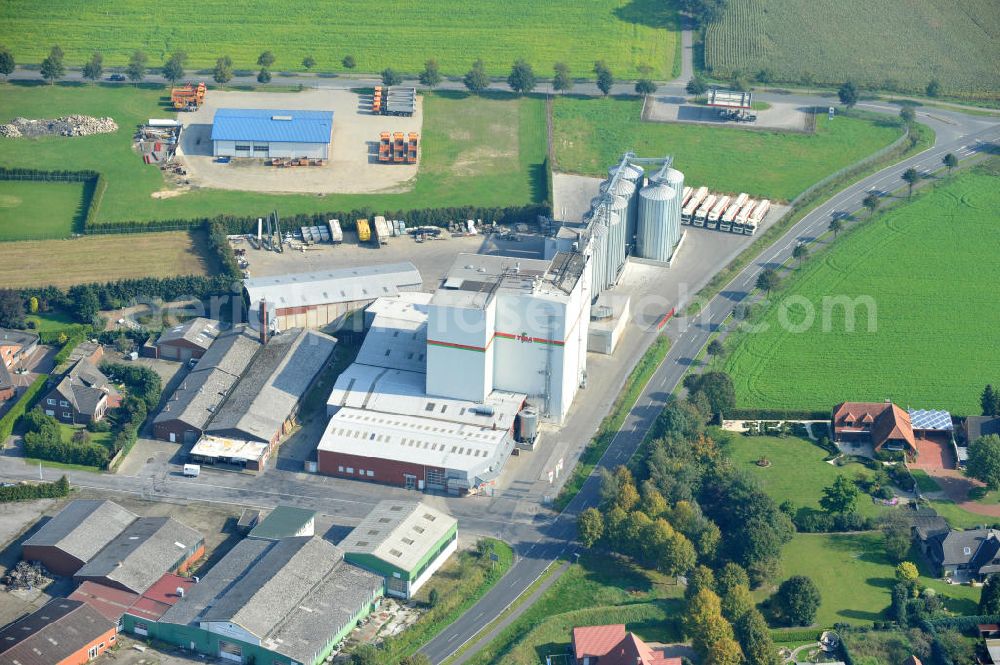 Bawinkel from above - Blick auf das Firmengelände des Landhandels und Kraftfutterwerk der Tihen GmbH & Co KG in Bawinkel / Niedersachsen. Die Marke TIBA Kraftfutter ist in der deutschen und europäischen Tierzucht und Landwirtschaft weit verbreitet. Premises of Tihen GmbH & Co KG in Bawinkel / Lower Saxony. The brand TIBA feed is in the German and European animal breeding and farming is widespread.