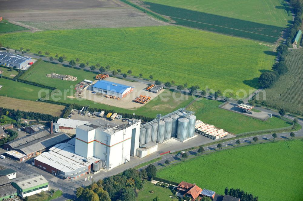 Aerial image Bawinkel - Blick auf das Firmengelände des Landhandels und Kraftfutterwerk der Tihen GmbH & Co KG in Bawinkel / Niedersachsen. Die Marke TIBA Kraftfutter ist in der deutschen und europäischen Tierzucht und Landwirtschaft weit verbreitet. Premises of Tihen GmbH & Co KG in Bawinkel / Lower Saxony. The brand TIBA feed is in the German and European animal breeding and farming is widespread.