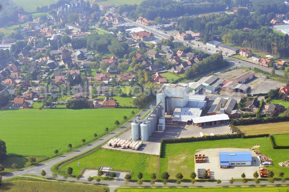 Bawinkel from above - Blick auf das Firmengelände des Landhandels und Kraftfutterwerk der Tihen GmbH & Co KG in Bawinkel / Niedersachsen. Die Marke TIBA Kraftfutter ist in der deutschen und europäischen Tierzucht und Landwirtschaft weit verbreitet. Premises of Tihen GmbH & Co KG in Bawinkel / Lower Saxony. The brand TIBA feed is in the German and European animal breeding and farming is widespread.