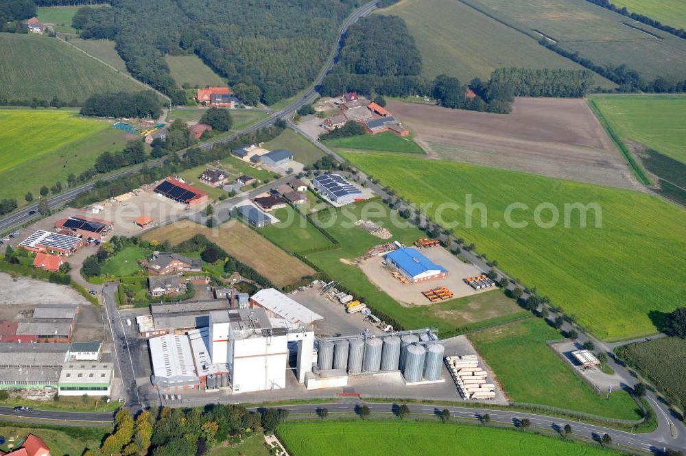 Aerial image Bawinkel - Blick auf das Firmengelände des Landhandels und Kraftfutterwerk der Tihen GmbH & Co KG in Bawinkel / Niedersachsen. Die Marke TIBA Kraftfutter ist in der deutschen und europäischen Tierzucht und Landwirtschaft weit verbreitet. Premises of Tihen GmbH & Co KG in Bawinkel / Lower Saxony. The brand TIBA feed is in the German and European animal breeding and farming is widespread.