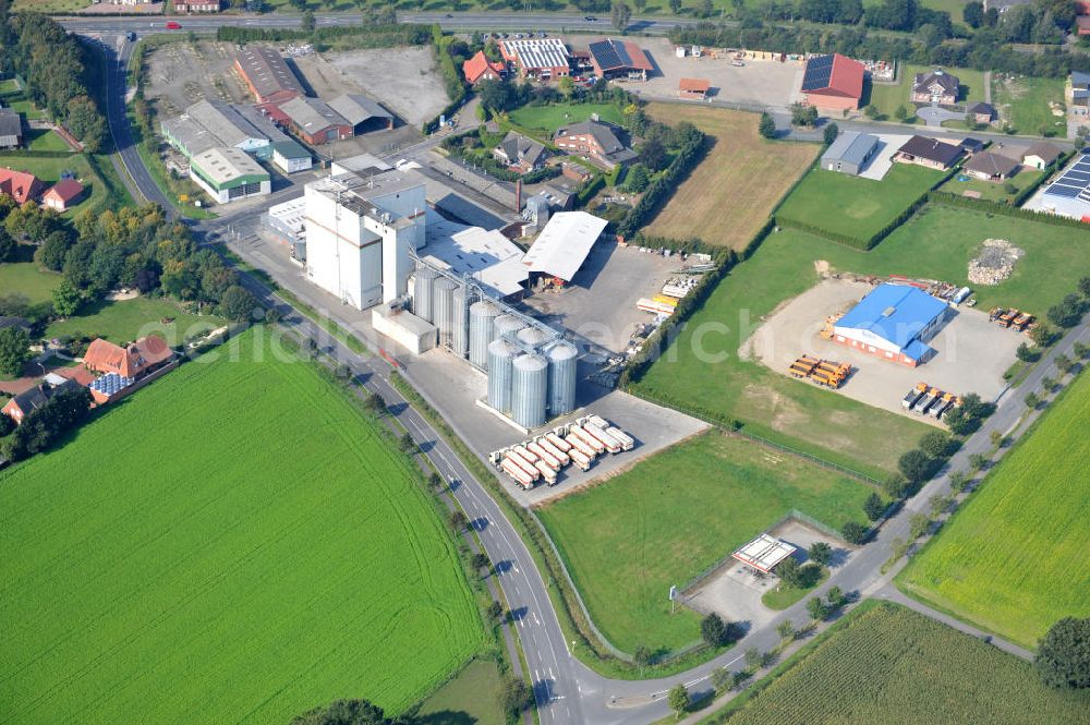 Aerial photograph Bawinkel - Blick auf das Firmengelände des Landhandels und Kraftfutterwerk der Tihen GmbH & Co KG in Bawinkel / Niedersachsen. Die Marke TIBA Kraftfutter ist in der deutschen und europäischen Tierzucht und Landwirtschaft weit verbreitet. Premises of Tihen GmbH & Co KG in Bawinkel / Lower Saxony. The brand TIBA feed is in the German and European animal breeding and farming is widespread.