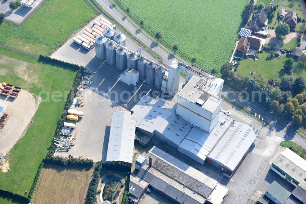 Aerial image Bawinkel - Blick auf das Firmengelände des Landhandels und Kraftfutterwerk der Tihen GmbH & Co KG in Bawinkel / Niedersachsen. Die Marke TIBA Kraftfutter ist in der deutschen und europäischen Tierzucht und Landwirtschaft weit verbreitet. Premises of Tihen GmbH & Co KG in Bawinkel / Lower Saxony. The brand TIBA feed is in the German and European animal breeding and farming is widespread.