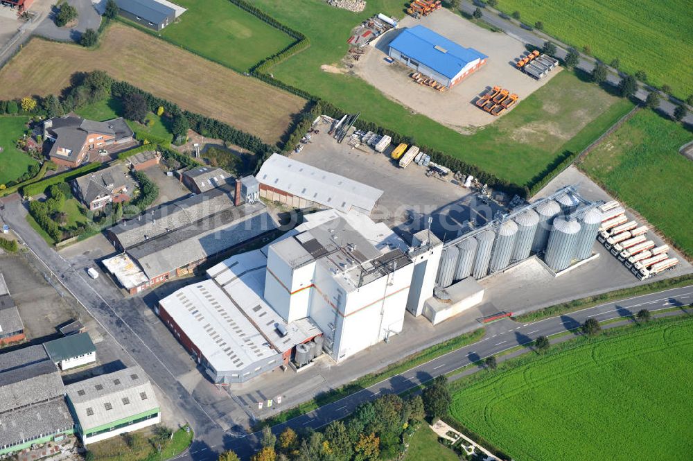 Bawinkel from the bird's eye view: Blick auf das Firmengelände des Landhandels und Kraftfutterwerk der Tihen GmbH & Co KG in Bawinkel / Niedersachsen. Die Marke TIBA Kraftfutter ist in der deutschen und europäischen Tierzucht und Landwirtschaft weit verbreitet. Premises of Tihen GmbH & Co KG in Bawinkel / Lower Saxony. The brand TIBA feed is in the German and European animal breeding and farming is widespread.