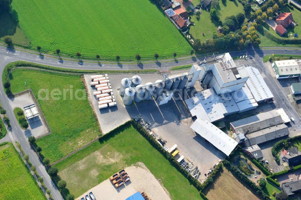 Bawinkel from above - Blick auf das Firmengelände des Landhandels und Kraftfutterwerk der Tihen GmbH & Co KG in Bawinkel / Niedersachsen. Die Marke TIBA Kraftfutter ist in der deutschen und europäischen Tierzucht und Landwirtschaft weit verbreitet. Premises of Tihen GmbH & Co KG in Bawinkel / Lower Saxony. The brand TIBA feed is in the German and European animal breeding and farming is widespread.