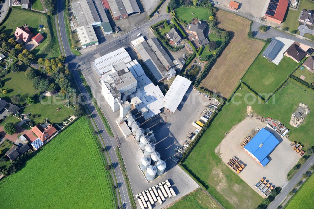 Bawinkel from above - Blick auf das Firmengelände des Landhandels und Kraftfutterwerk der Tihen GmbH & Co KG in Bawinkel / Niedersachsen. Die Marke TIBA Kraftfutter ist in der deutschen und europäischen Tierzucht und Landwirtschaft weit verbreitet. Premises of Tihen GmbH & Co KG in Bawinkel / Lower Saxony. The brand TIBA feed is in the German and European animal breeding and farming is widespread.