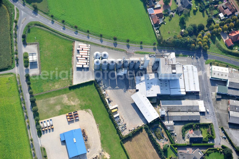 Aerial image Bawinkel - Blick auf das Firmengelände des Landhandels und Kraftfutterwerk der Tihen GmbH & Co KG in Bawinkel / Niedersachsen. Die Marke TIBA Kraftfutter ist in der deutschen und europäischen Tierzucht und Landwirtschaft weit verbreitet. Premises of Tihen GmbH & Co KG in Bawinkel / Lower Saxony. The brand TIBA feed is in the German and European animal breeding and farming is widespread.