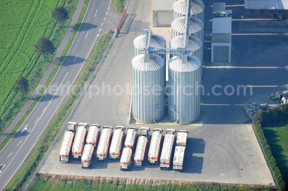 Bawinkel from the bird's eye view: Blick auf das Firmengelände des Landhandels und Kraftfutterwerk der Tihen GmbH & Co KG in Bawinkel / Niedersachsen. Die Marke TIBA Kraftfutter ist in der deutschen und europäischen Tierzucht und Landwirtschaft weit verbreitet. Premises of Tihen GmbH & Co KG in Bawinkel / Lower Saxony. The brand TIBA feed is in the German and European animal breeding and farming is widespread.