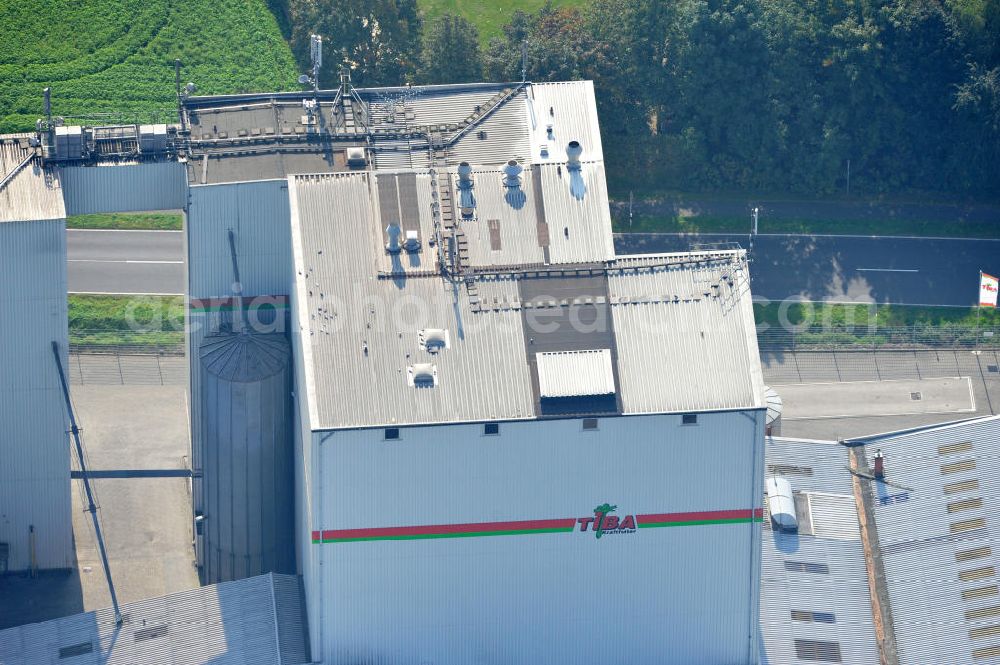 Aerial image Bawinkel - Blick auf das Firmengelände des Landhandels und Kraftfutterwerk der Tihen GmbH & Co KG in Bawinkel / Niedersachsen. Die Marke TIBA Kraftfutter ist in der deutschen und europäischen Tierzucht und Landwirtschaft weit verbreitet. Premises of Tihen GmbH & Co KG in Bawinkel / Lower Saxony. The brand TIBA feed is in the German and European animal breeding and farming is widespread.