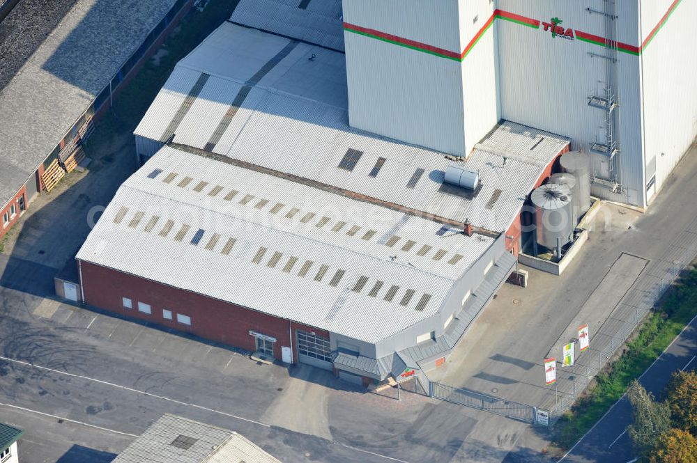 Aerial photograph Bawinkel - Blick auf das Firmengelände des Landhandels und Kraftfutterwerk der Tihen GmbH & Co KG in Bawinkel / Niedersachsen. Die Marke TIBA Kraftfutter ist in der deutschen und europäischen Tierzucht und Landwirtschaft weit verbreitet. Premises of Tihen GmbH & Co KG in Bawinkel / Lower Saxony. The brand TIBA feed is in the German and European animal breeding and farming is widespread.