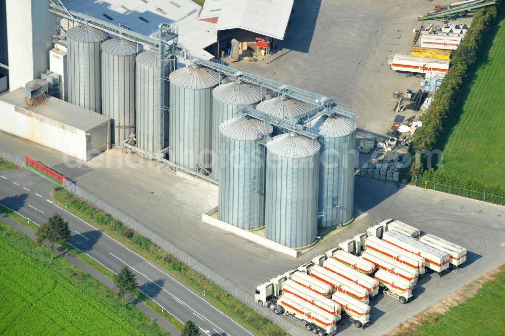 Aerial image Bawinkel - Blick auf das Firmengelände des Landhandels und Kraftfutterwerk der Tihen GmbH & Co KG in Bawinkel / Niedersachsen. Die Marke TIBA Kraftfutter ist in der deutschen und europäischen Tierzucht und Landwirtschaft weit verbreitet. Premises of Tihen GmbH & Co KG in Bawinkel / Lower Saxony. The brand TIBA feed is in the German and European animal breeding and farming is widespread.