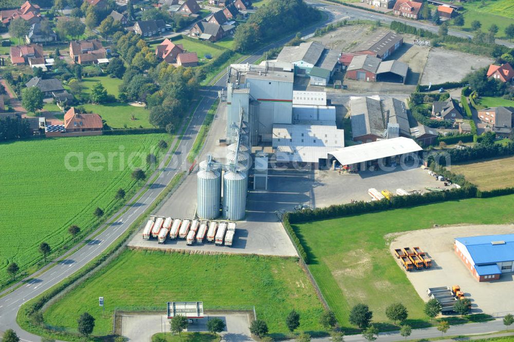 Aerial image Bawinkel - Blick auf das Firmengelände des Landhandels und Kraftfutterwerk der Tihen GmbH & Co KG in Bawinkel / Niedersachsen. Die Marke TIBA Kraftfutter ist in der deutschen und europäischen Tierzucht und Landwirtschaft weit verbreitet. Premises of Tihen GmbH & Co KG in Bawinkel / Lower Saxony. The brand TIBA feed is in the German and European animal breeding and farming is widespread.