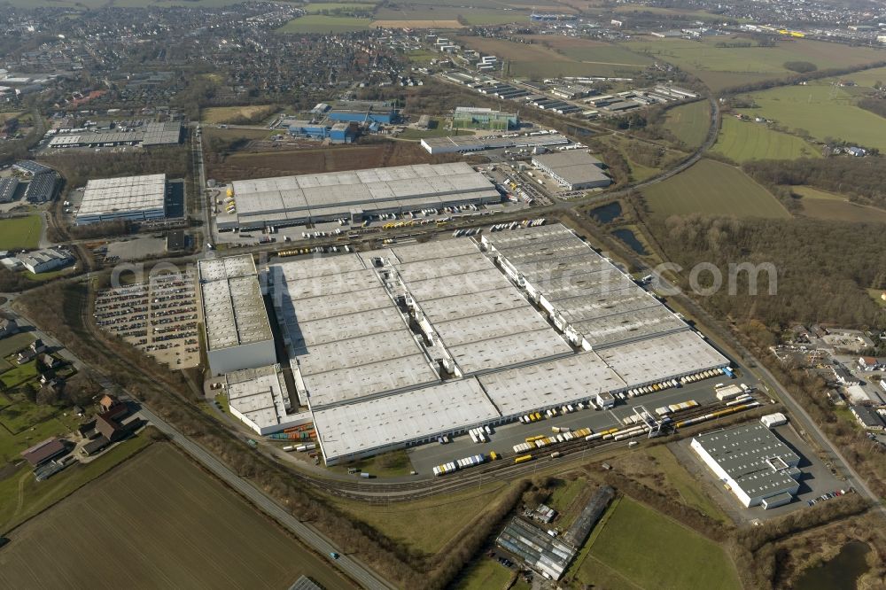 Unna from the bird's eye view: Premises of the logistics center of DHL Solutions Retail GmbH, a logistics company DHL at the Gießerstraße in Unna in the Ruhr area in North Rhine-Westphalia